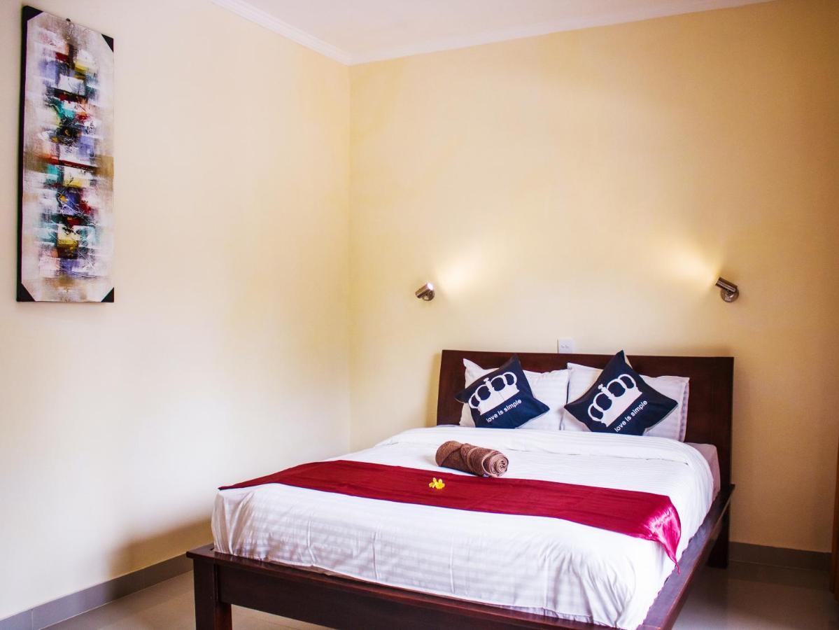 Bali 85 Beach Inn Падангбай Екстериор снимка