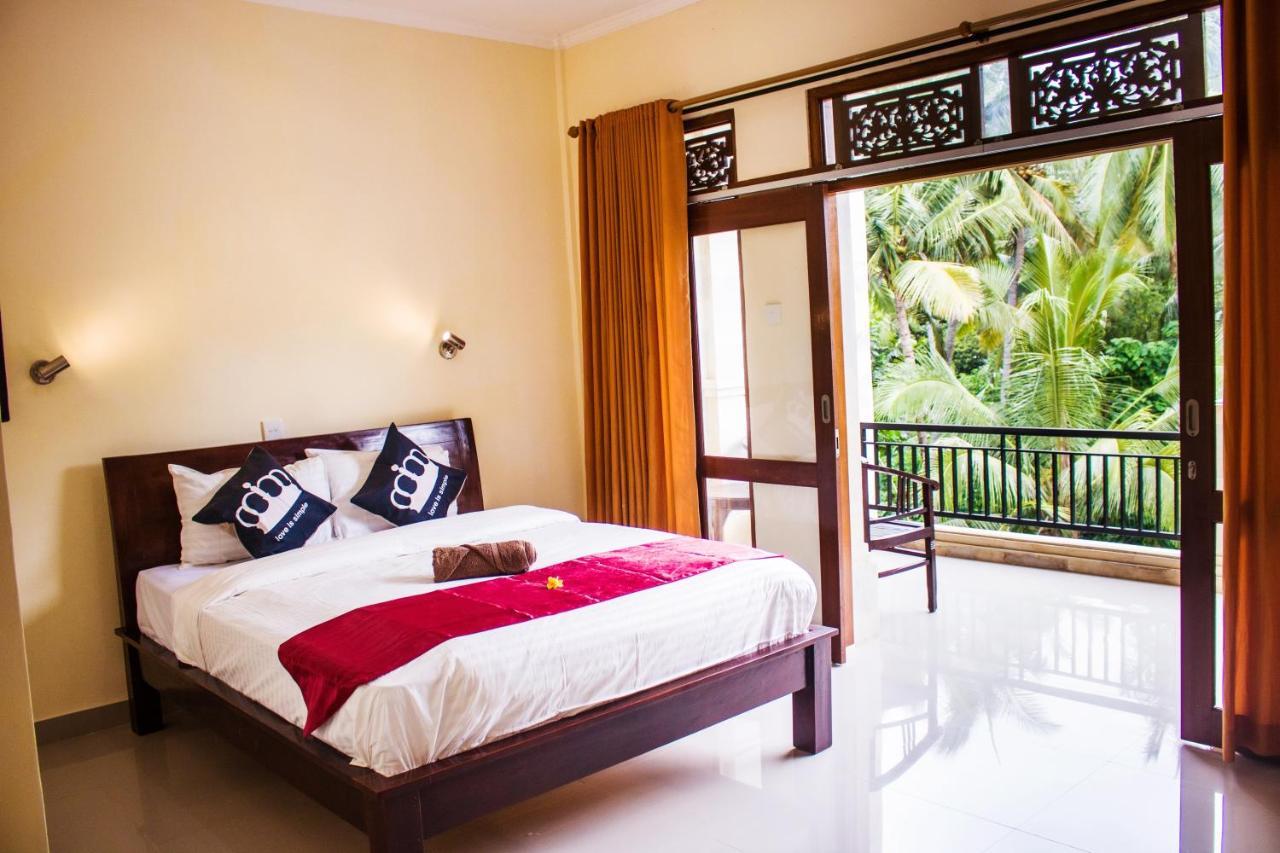 Bali 85 Beach Inn Падангбай Екстериор снимка