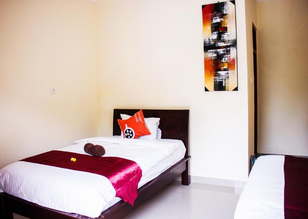 Bali 85 Beach Inn Падангбай Екстериор снимка