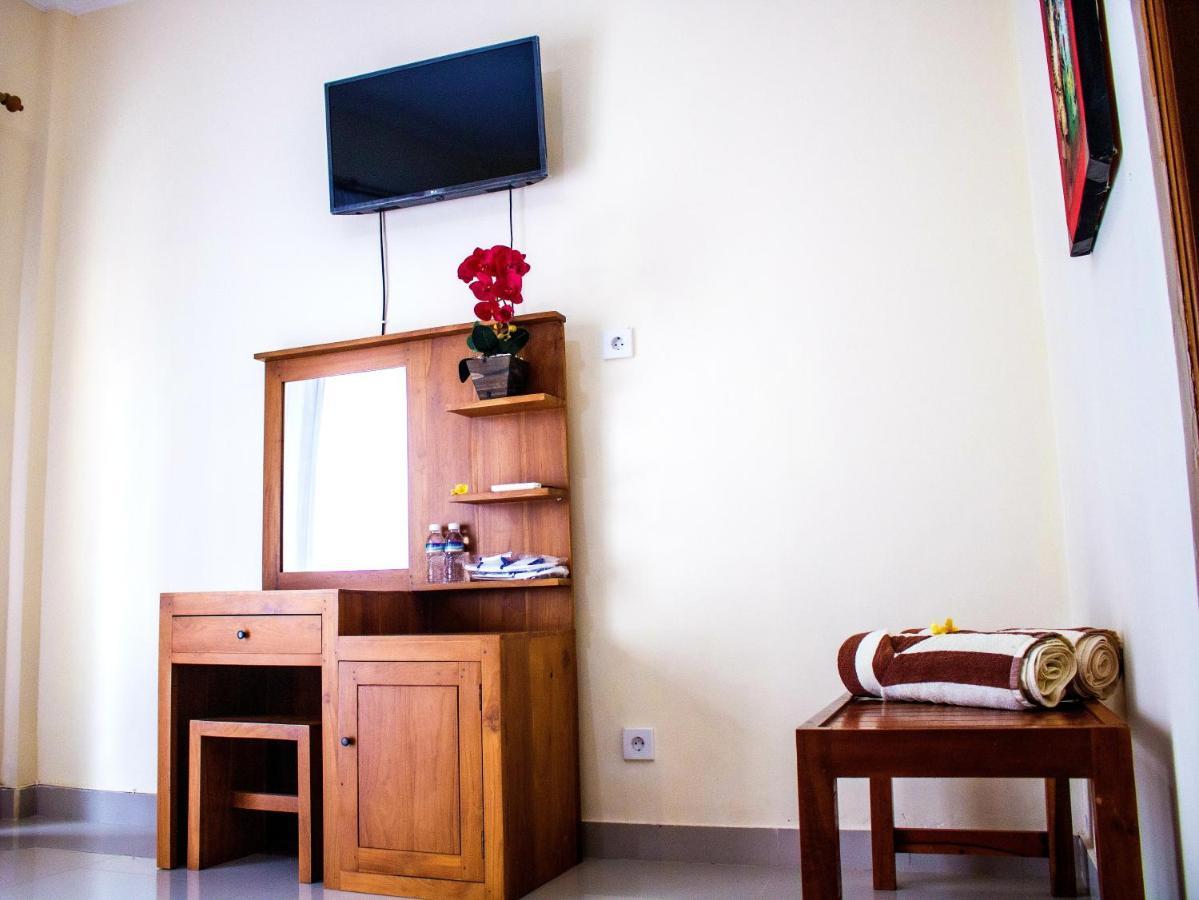 Bali 85 Beach Inn Падангбай Екстериор снимка