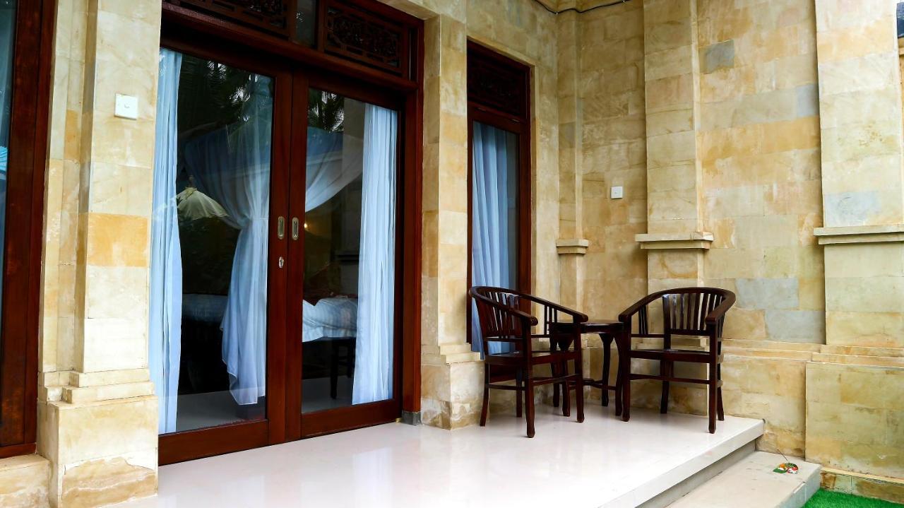 Bali 85 Beach Inn Падангбай Екстериор снимка