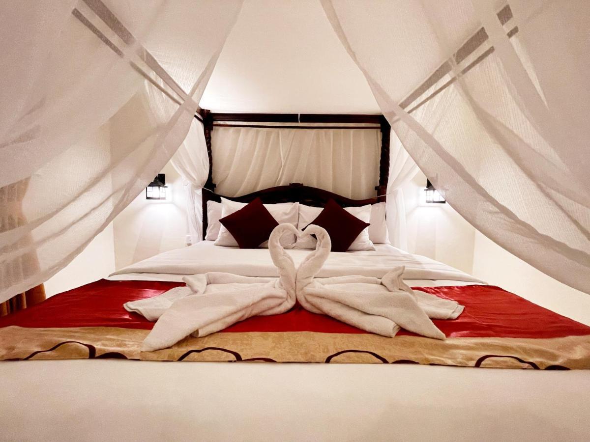 Bali 85 Beach Inn Падангбай Екстериор снимка