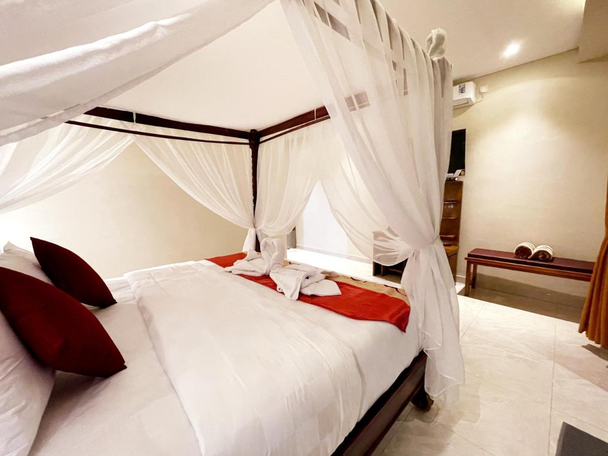Bali 85 Beach Inn Падангбай Екстериор снимка