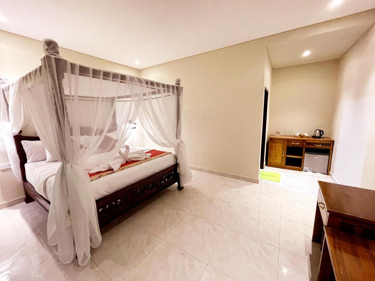 Bali 85 Beach Inn Падангбай Екстериор снимка