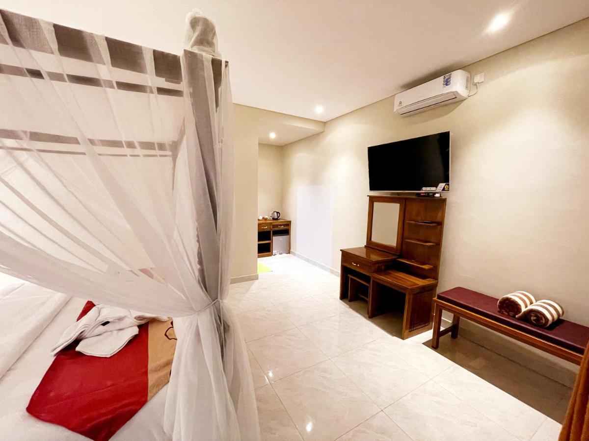 Bali 85 Beach Inn Падангбай Екстериор снимка