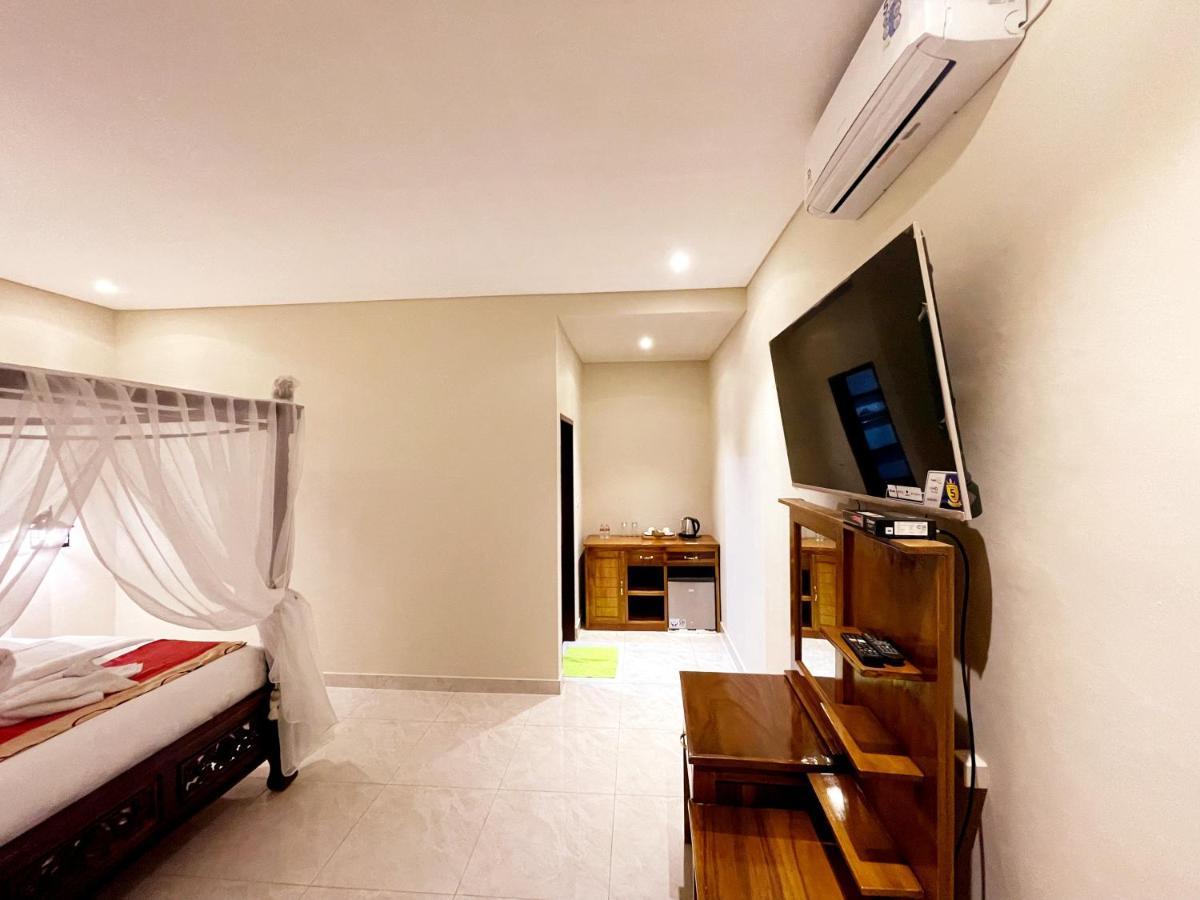 Bali 85 Beach Inn Падангбай Екстериор снимка